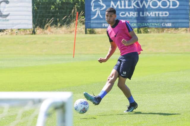 Louis Dennis got down to business as the Pompey players returned to pre-season training on Wednesday. Picture: Habibur Rahman