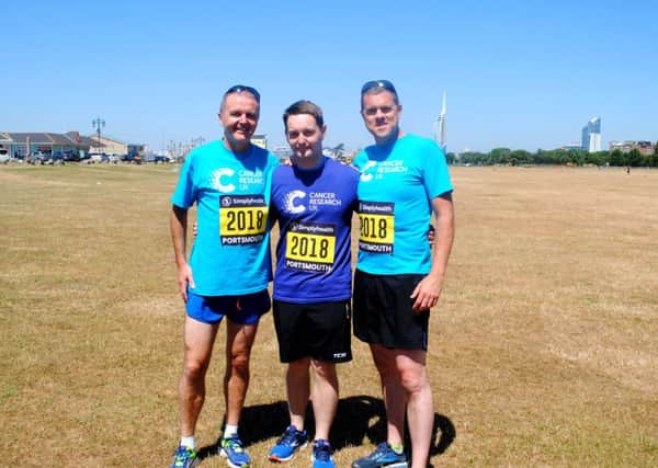 From left, Insp David Knowles, PCSO Neil Chapman and Sgt Rob Sutton who are taking part in this year's Great South Run


Picture: Kerry Simpson