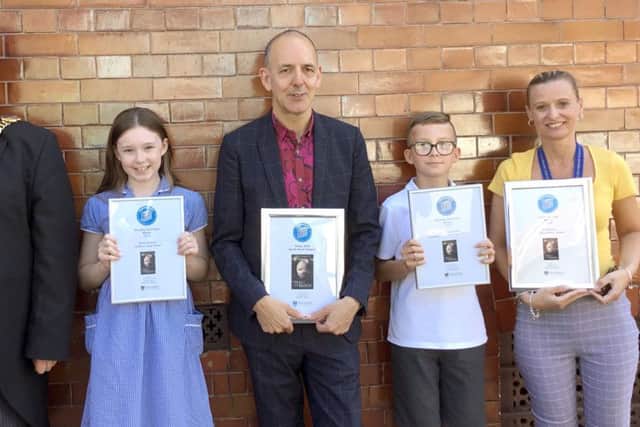 Left to right, Reading Champion Olivia Hancock, Portsmouth Book Award (Shorter Novel) winner Chris Priestley, Reading Champion Jakub Kluszczynski and Inspirational Adult winner Hayley Stallard