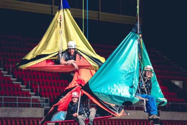 Travel writer and author Phoebe Smith, rigging specialist Ollie Laker and rope specialist and A&E doctor John Pike suspended at the Stadium of Light. Picture: Zak Bentley