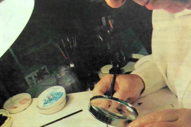 June Blyth works on one of her miniatures
