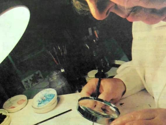 June Blyth works on one of her miniatures