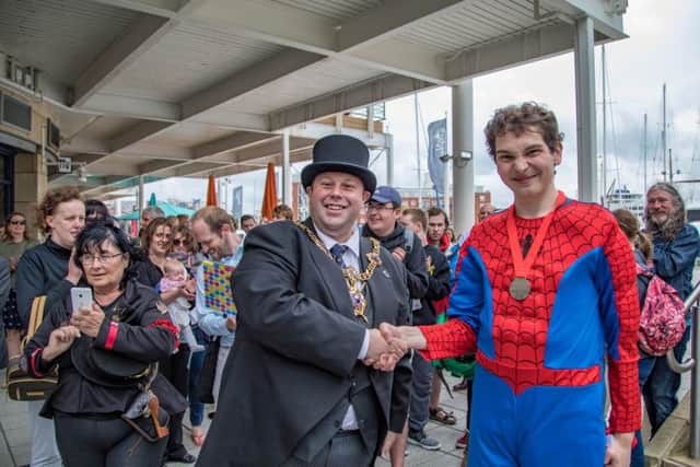 Harley Salter, right, with Lord Mayor of Portsmouth Cllr Lee Mason after finishing the abseil