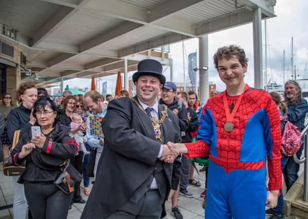 Harley Salter, right, with Lord Mayor of Portsmouth Cllr Lee Mason after finishing the abseil