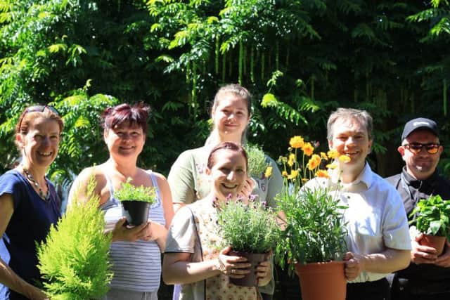Residents spent the day planting flowers and shrubs to brighten up Waverley Road in a Portsmouth City Council-hosted event      Picture: Portsmouth City Council