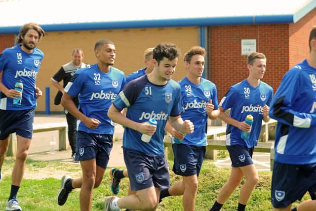 Pompey's players embark on a training run in 2016 pre-season