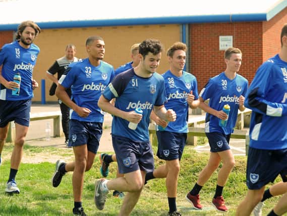 Pompey's players embark on a training run in 2016 pre-season