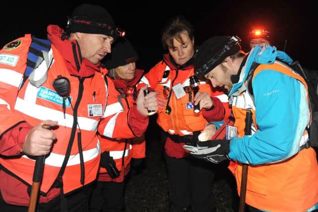 Search technician and medical training officer Gordon, search technician Julie Bennett, team leader Susan Hayward and trainee searcher Cai Ruddick-Smith during the training search.
Picture: Sarah Standing