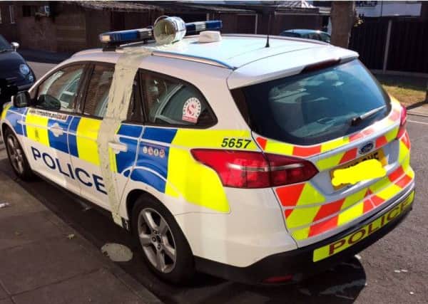 The car - with a tin of paint on its roof - in Fifth Street, Portsmouth. Picture: Hants Response Cops on Twitter