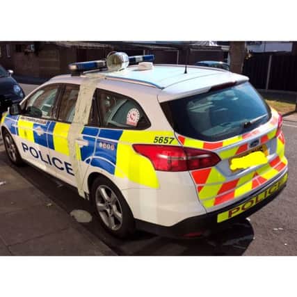 The car - with a tin of paint on its roof - in Fifth Street, Portsmouth. Picture: Hants Response Cops on Twitter