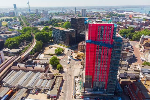 The Crown Place student accommodation tower in Station Street - with the detached lifting platform visible, with blue netting. Done picture: Phillip Bramble