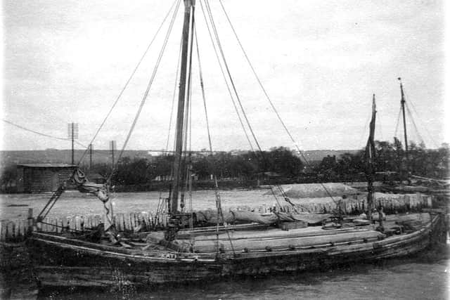 The Kate alongside a wharf at high water believed to have been taken in the 1920s.