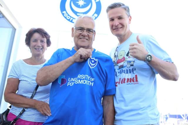 Season Ticket Holders, Janice Illingworth, Ben Greaves and Roland Haselton with the new kit. Picture : Habibur Rahman