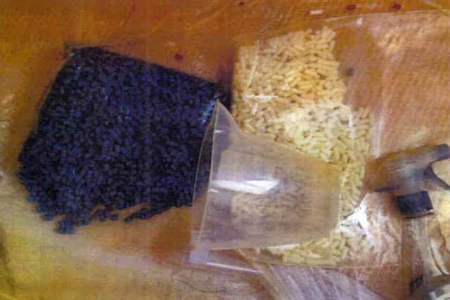 Two bags of pills alongside a measuring jug, evidence from the court case Picture: Harrow Council/PA Wire