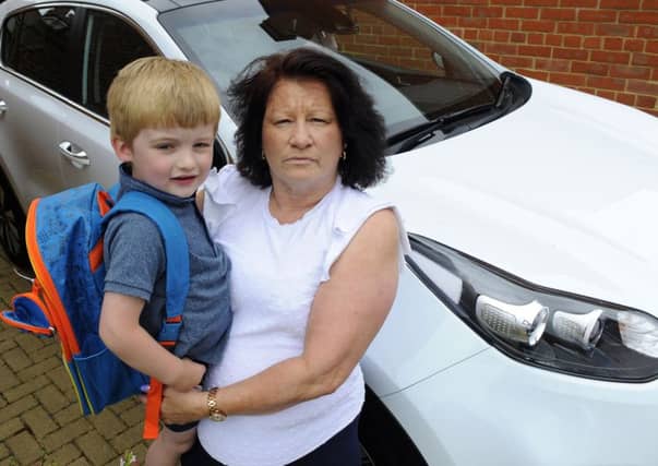 Anita Wilson (56) from Waterlooville with her grandson Alfie McHugh (3) who she had been looking after when he was taken ill in the Marks and Spencer store in Havant Picture: Malcolm Wells (180617-4227)
