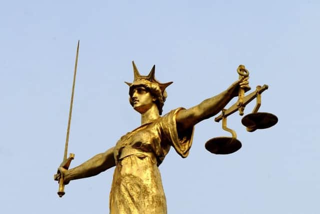 The scales of justice. Ian Nicholson / PA