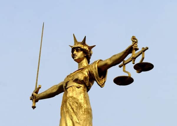 The scales of justice. Ian Nicholson / PA