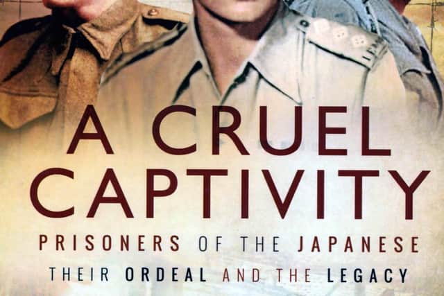 Portsmouth-born Capt Albert Symonds, centre, on the cover of A Cruel Captivity.