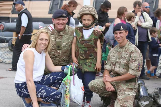 Michelle Bates, WO2 Lloyd Gillingham, Noah, six, and Gnr Ryan Hancock pictured at last year's Armed Forces Day. PHOTO: Habibur Rahman PPP-170625-000554006