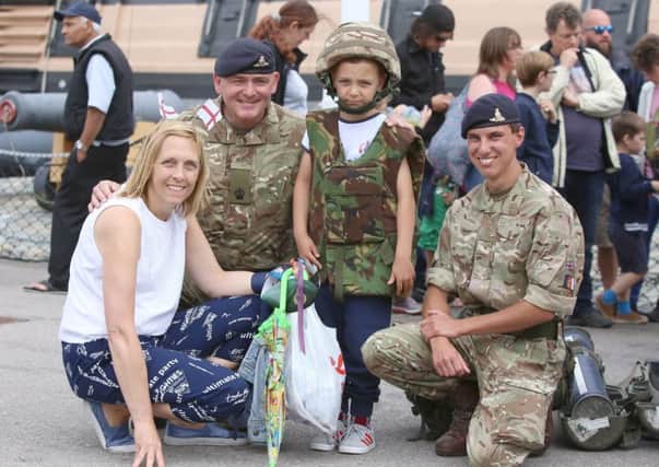 Michelle Bates, WO2 Lloyd Gillingham, Noah, six, and Gnr Ryan Hancock pictured at last year's Armed Forces Day. PHOTO: Habibur Rahman PPP-170625-000554006