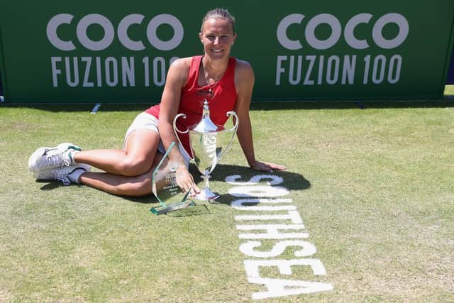 Kirsten Flipkens celebrates her Coco Fuzion 100 Southsea Trophy triumph. Picture: Getty Images for LTA