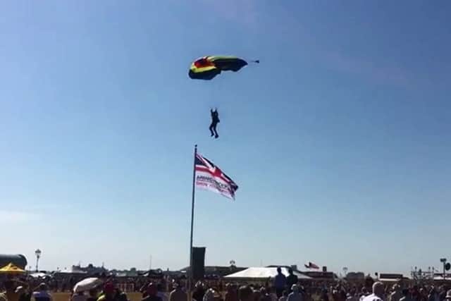 The Lightning Bolt army parachute team arrive at Armed Forces Day in Southsea Common. Picture: Ben Fishwick