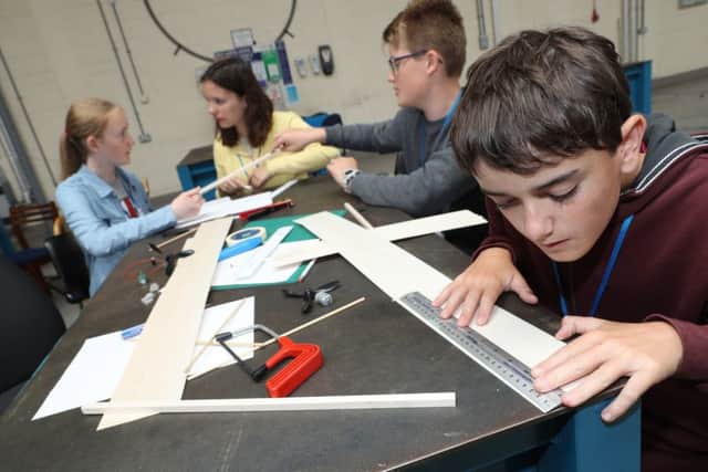 Youngsters working on an engineering project at HMS Sultan. Picture: PO Phot Nicola Harper