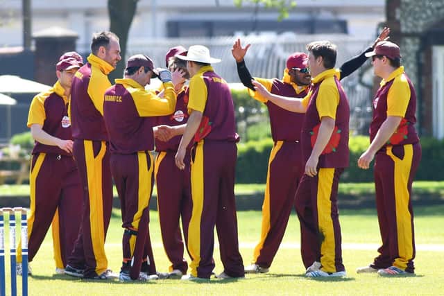 Graham Burns, second left, has taken 29 wickets this season. Picture: Neil Marshall