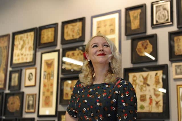 A new exhibition showing the history of tattooing has been opened at The National Museum of the Royal Navy in Portsmouth. Co-curator, Alice Roberts-Pratt. Picture Ian Hargreaves  (180629-13_tattoo)