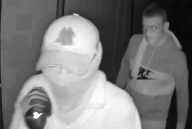 Police want to speak to these two men in connection with the theft