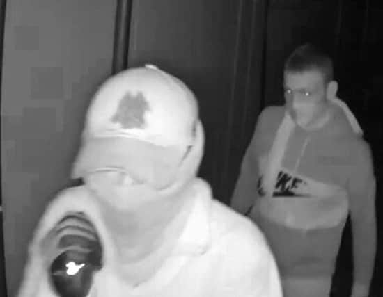 Police want to speak to these two men in connection with the theft