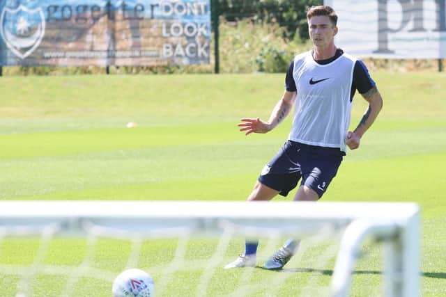 Oli Hawkins takes part in pre-season training