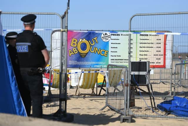 The scene on Gorleston beach in Norfolk, after a young girl died after being thrown from a bouncy castle. Picture: Joe Giddens/PA Wire