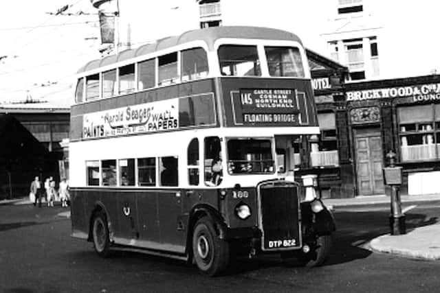 A corporation bus heading for the floating bridge.