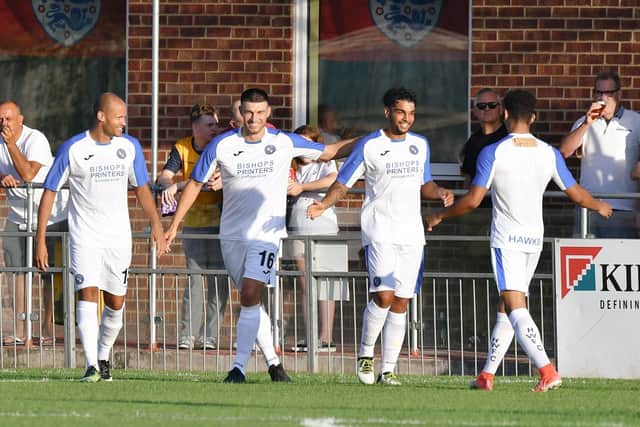 Theo Lewis celebrates scoring in the opening minute. Picture: Neil Marshall