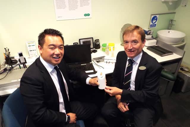 Alan Mak MP with Specsavers Havant audiology director Clive Harrod