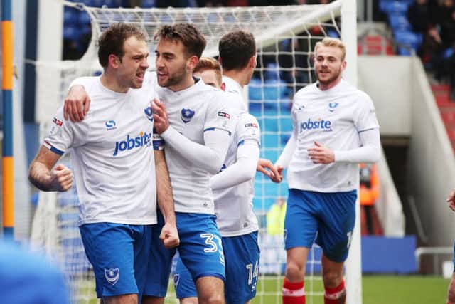 Brett Pitman celebrates his superb header at Oldham. Picture: Joe Pepler