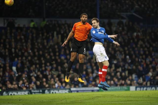 Brett Pitman outjumps Anton Ferdinand to score against Southend. Picture: Joe Pepler