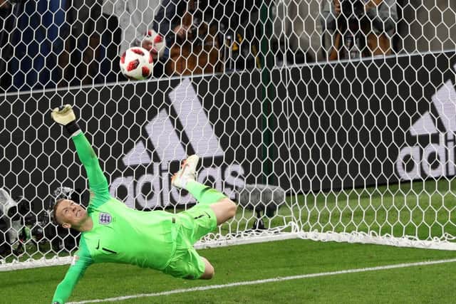 England goalkeeper Jordan Pickford saves a penalty from Colombia's Carlos Bacca during the FIFA World Cup 2018, round of 16 match at the Spartak Stadium, Moscow. Picture: Aaron Chown/ PA Wire