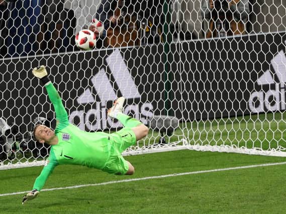 England goalkeeper Jordan Pickford saves a penalty from Colombia's Carlos Bacca during the FIFA World Cup 2018, round of 16 match at the Spartak Stadium, Moscow. Picture: Aaron Chown/ PA Wire