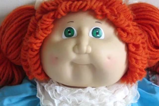 A Cabbage Patch doll.