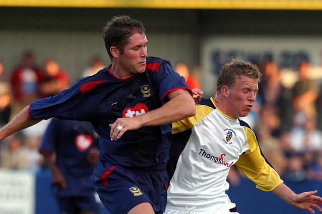 Lee Bradbury battles with James Ford
