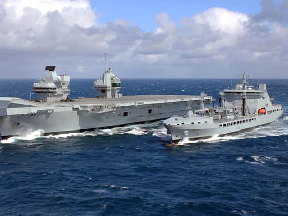 HMS Queen Elizabeth, which could one day deploy to the South China Sea, pictured during her first refuel at sea. Photo: Royal Navy