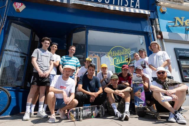Tom Knox (second left, front row) outside Bored of Southsea with fellow skateboarders. Picture: Keith Woodland