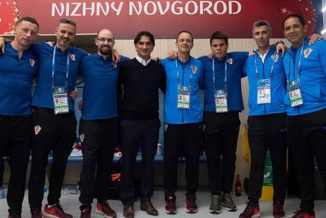 Marc Rochon, third from left, with the Croatian support team and manager Zlatko Dalic