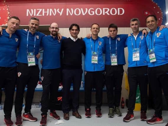 Marc Rochon, third from left, with the Croatian support team and manager Zlatko Dalic