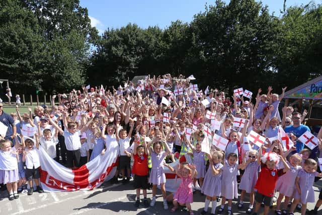 Pupils, parents and teachers celebrate the new England manager Gareth Southgate attended Padnell Infant School. Picture: Habibur Rahman