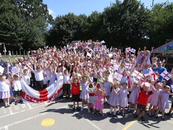 Pupils, parents and teachers celebrate the new England manager Gareth Southgate attended Padnell Infant School. Picture: Habibur Rahman