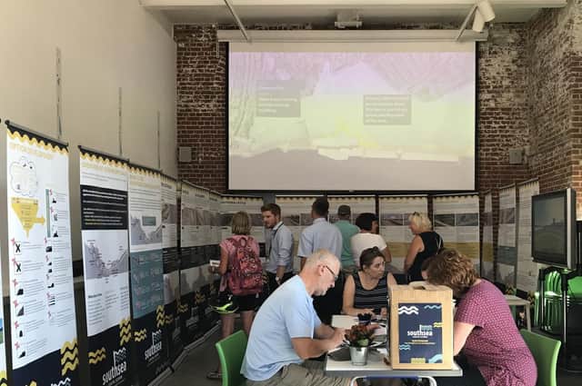 Residents take in the designs at the Southsea Coastal Scheme consultation at the Aspex Gallery at Gunwharf Quays on Tuesday afternoon. Picture: Byron Melton