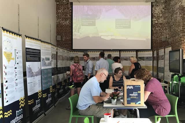 EXHIBITION Residents take in designs and fill out consultation forms at the Aspex Gallery. Picture: Byron Melton